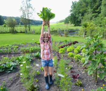 Kids gain pride from planting a garden and successfully harvesting food or flowers
