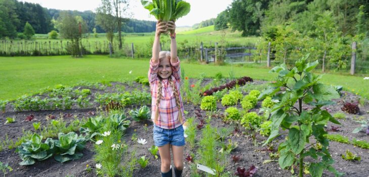 Kids gain pride from planting a garden and successfully harvesting food or flowers